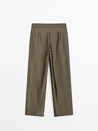 Flowing trousers with striped details