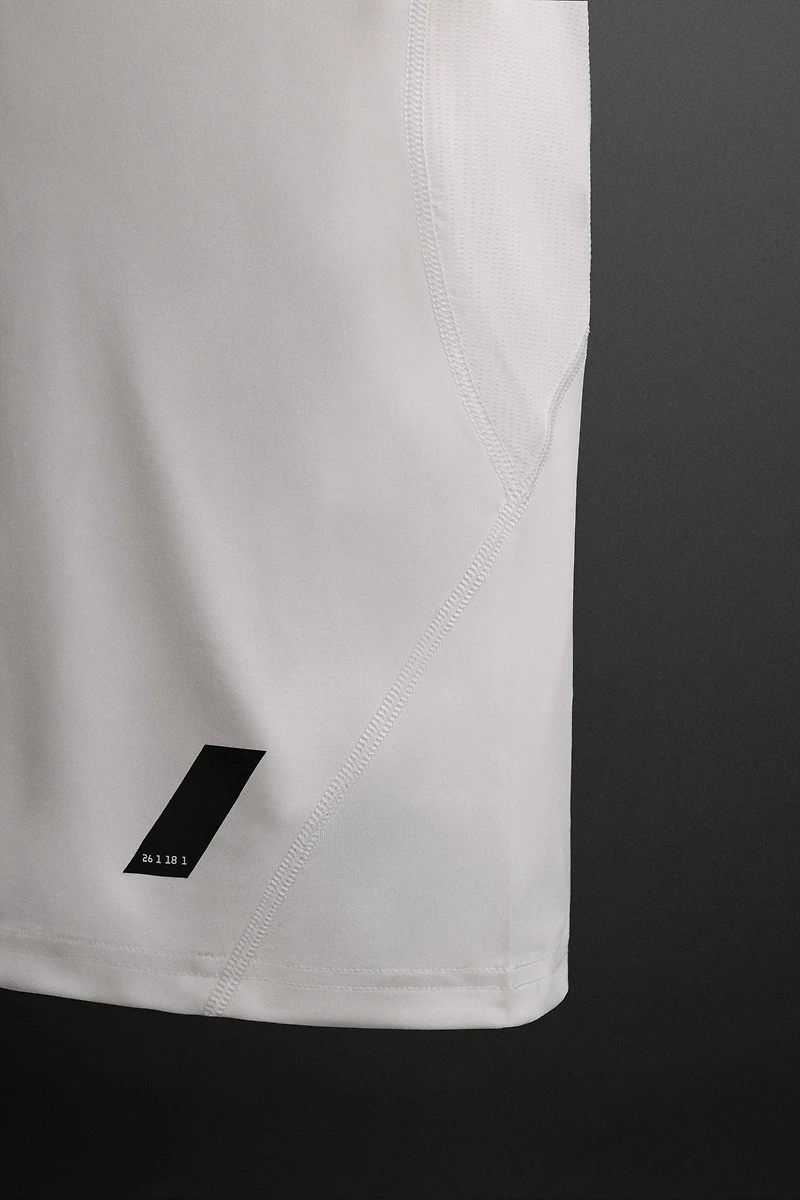 DÉBARDEUR DE COMPRESSION