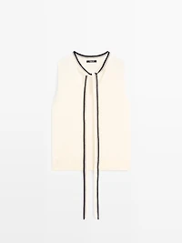 Knit vest with tie detail