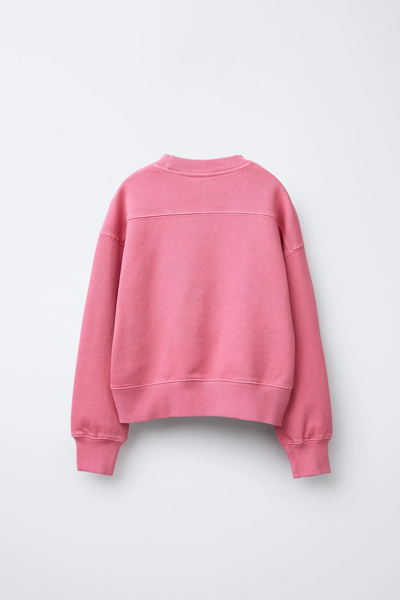 VARSITY PRINT SWEATSHIRT