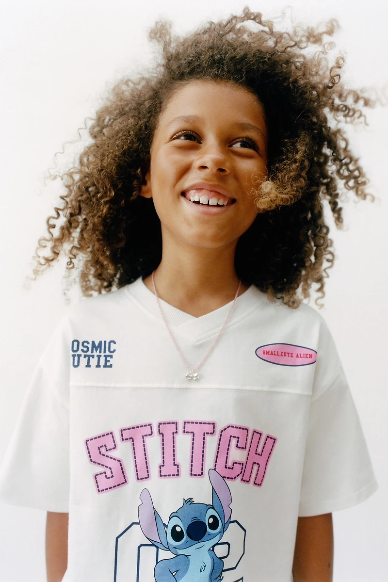 LILO & STITCH © DISNEY VARSITY T-SHIRT