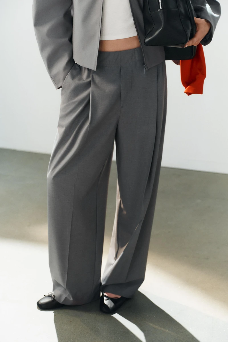 ELASTIC WAIST PLEATED TROUSERS
