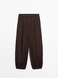 Pantalon bouffant détail plissé
