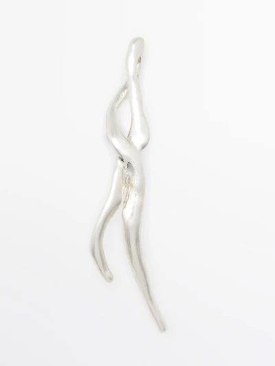 Broche métallique abstraite