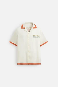CHEMISE SATINÉE À BANDES CONTRASTÉES