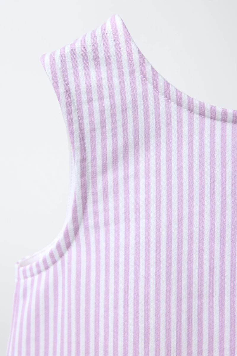 T-SHIRT À RAYURES AVEC PÉPLUM ET BIAIS EN CONTRASTE