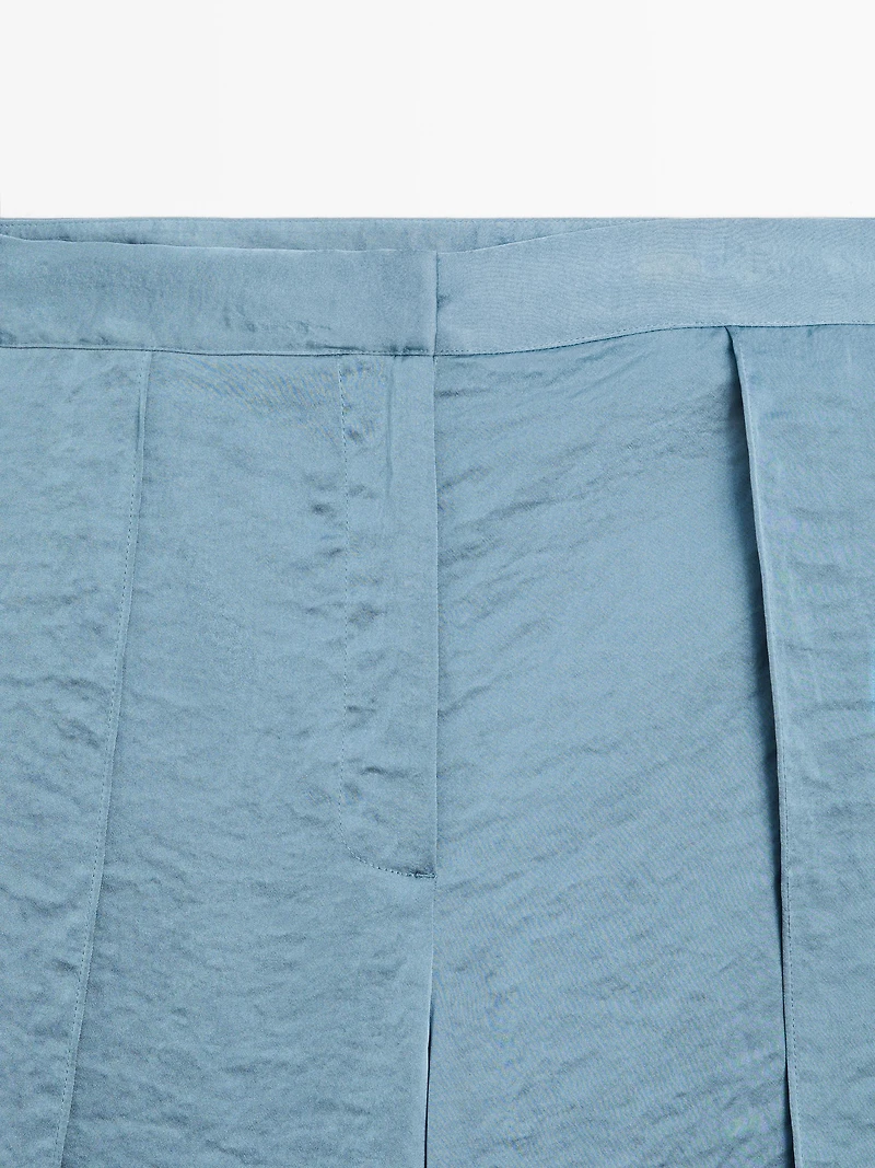 Flowing palazzo trousers with slits