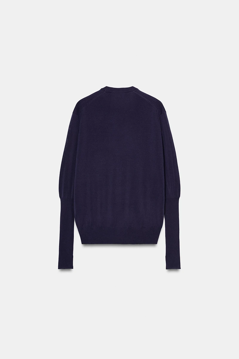 PULL EN MAILLES EXTRAFINES À COL V