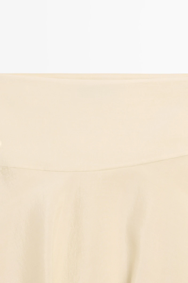 Flowing asymmetric midi skirt