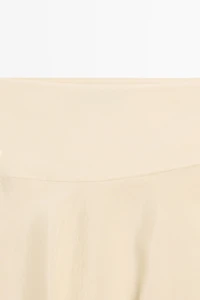Flowing asymmetric midi skirt