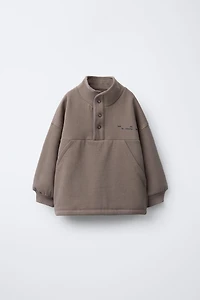 RAISED TEXT AND LOGO SWEATSHIRT