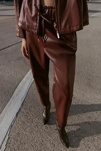 FAUX LEATHER ELASTIC WAIST PANTS