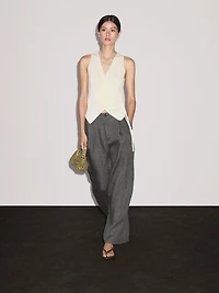 Knit crossover waistcoat with drawstring