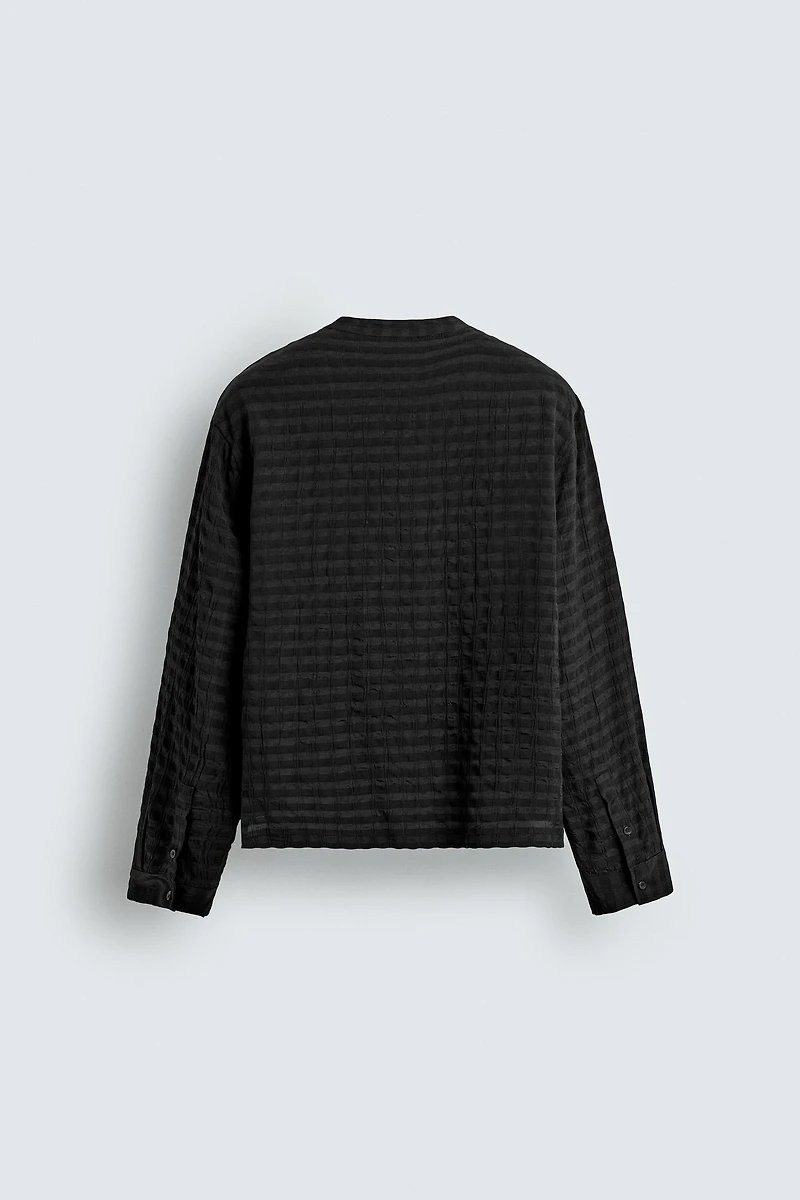 CHEMISE POLO FLUIDE STRUCTURÉE