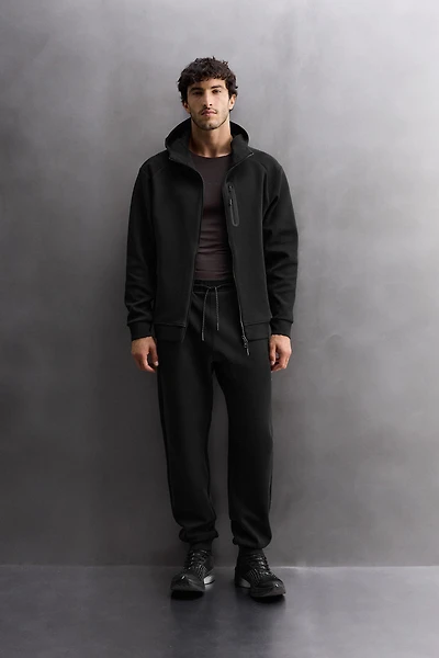 TECHNICAL ZIP-UP HOODIE
