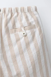 PANTALON BALLON À PLIS ET RAYURES