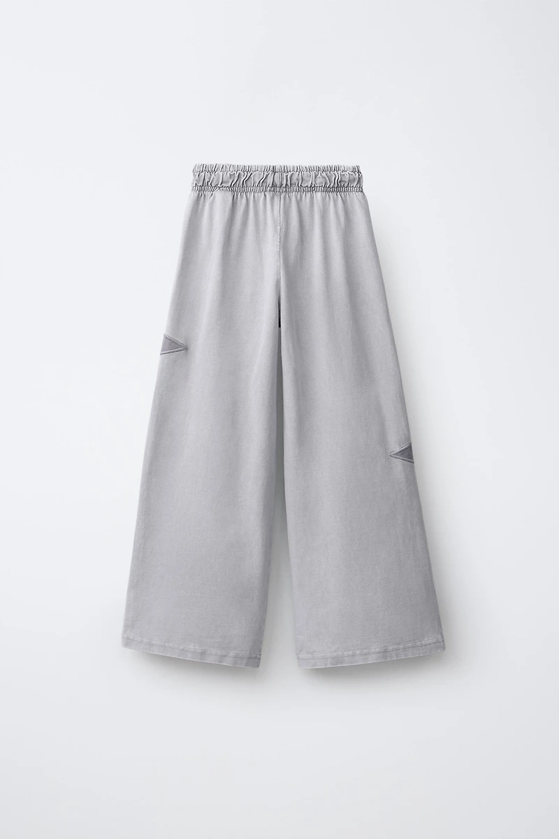 PANTALON LARGE EFFET DÉLAVÉ ÉTOILES