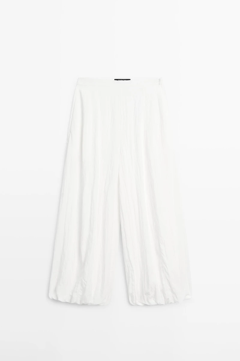 Flowing sarouel trousers with textured detail