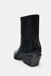 BOTTINES LARGES EN CUIR
