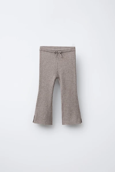 LEGGING EN MAILLE ÉVASÉ
