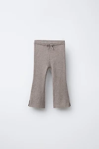 LEGGING EN MAILLE ÉVASÉ