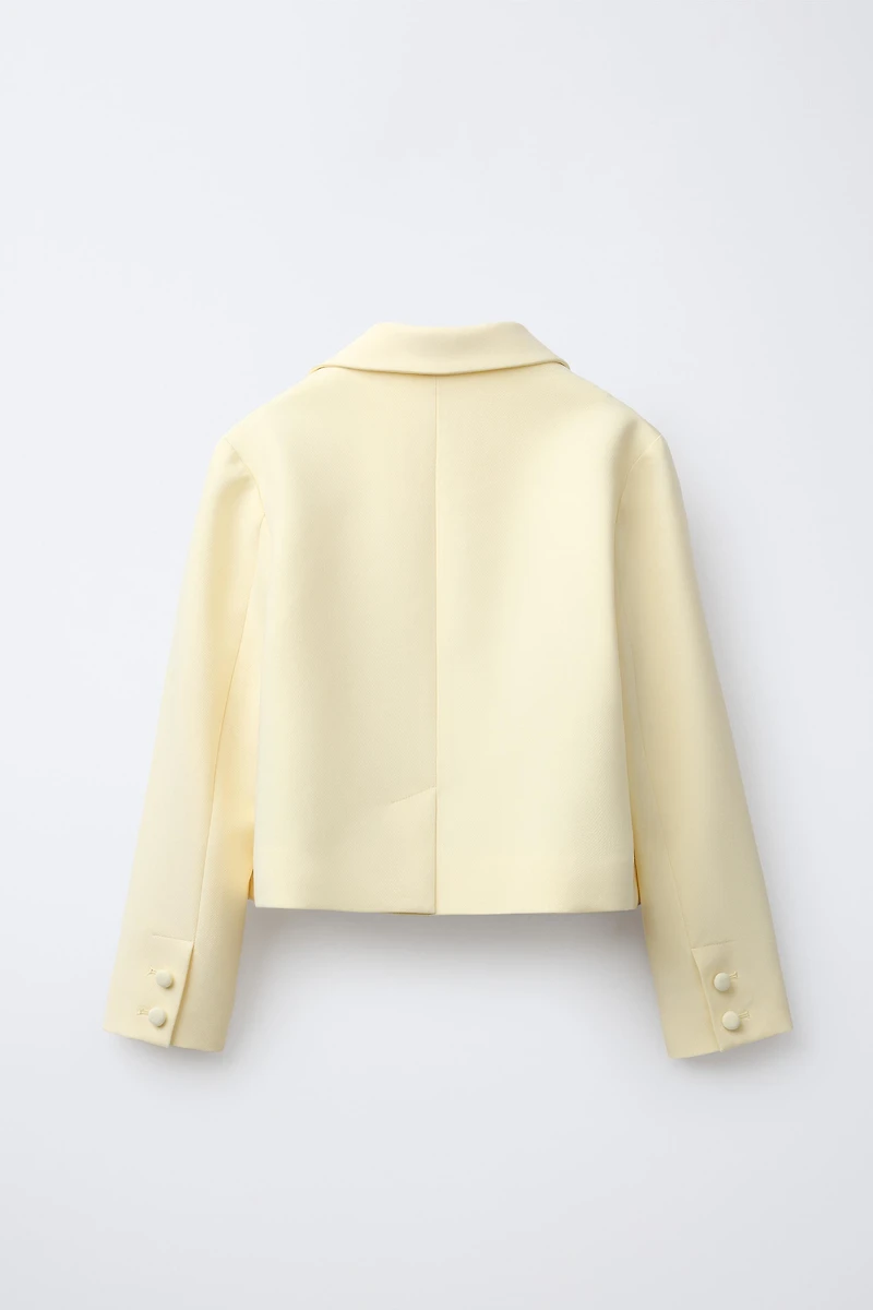 VESTE AVEC DÉCORS
