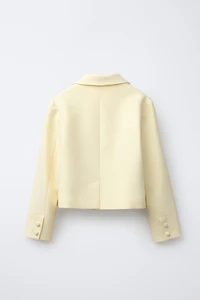 VESTE AVEC DÉCORS