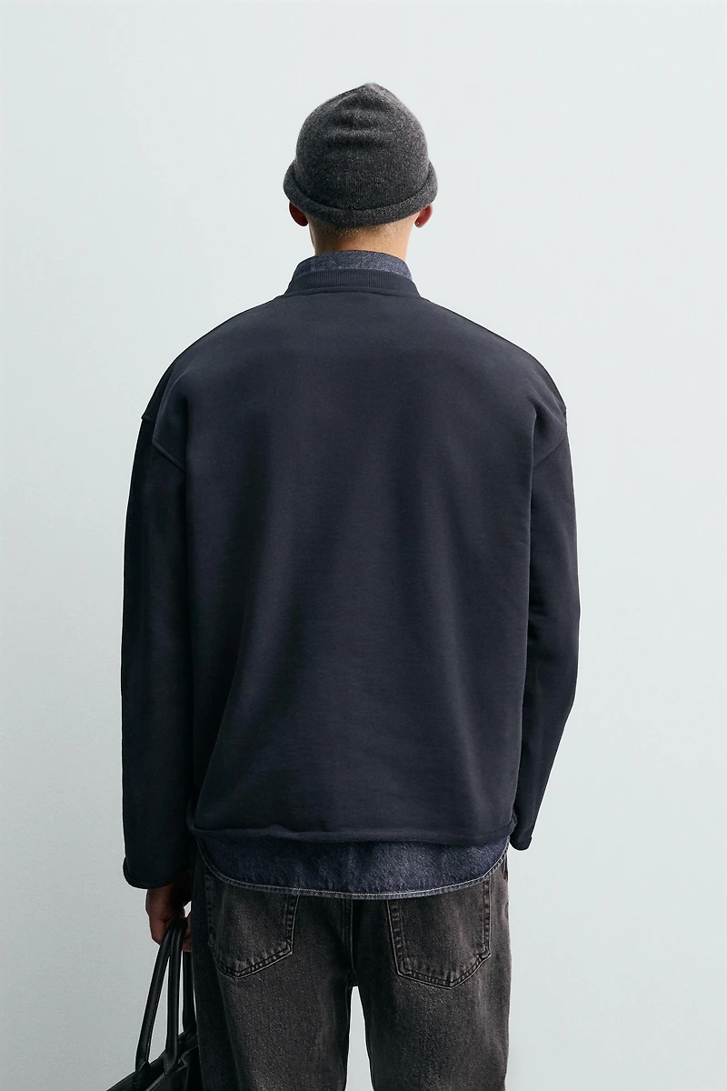 CREW NECK SWEATSHIRT WITH IRREGULAR FINISH