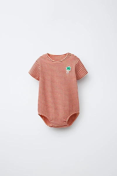 STRIPED PALM PATCH BODYSUIT WITH MODAL