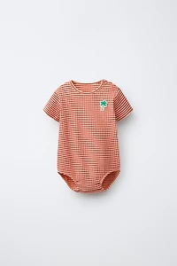STRIPED PALM PATCH BODYSUIT WITH MODAL