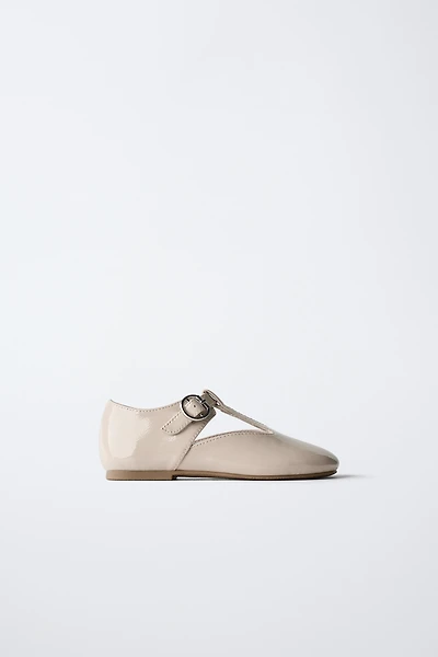 PATENT FINISH T-BAR BALLERINAS