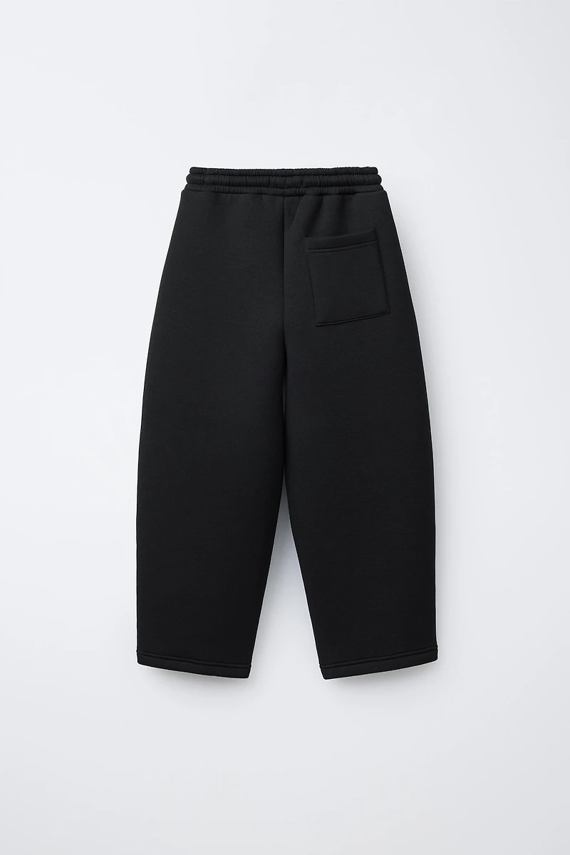 NEOPRENE EFFECT STRAIGHT FIT PANTS