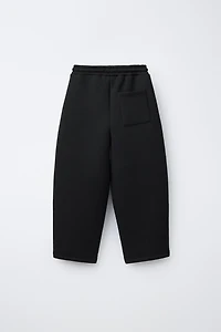 NEOPRENE EFFECT STRAIGHT FIT PANTS