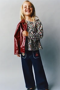 EMBROIDERED POCKET NAVY JEANS