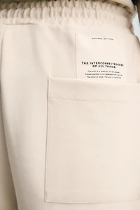 SHORT INTERLOCK ÉTIQUETTE