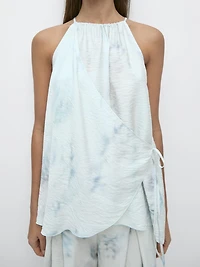 Flowing halterneck top with tie detail