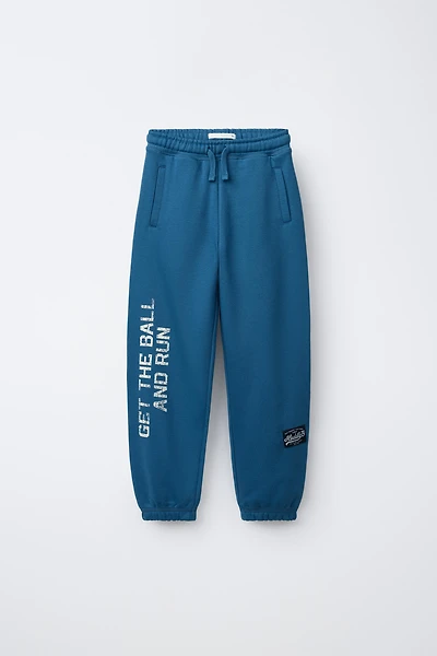 JOGGER PANTS WITH TEXT LABEL