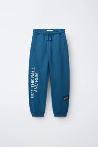 JOGGER PANTS WITH TEXT LABEL