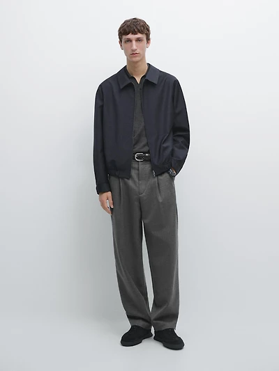 Pantalon relaxed fit à pinces en laine froide