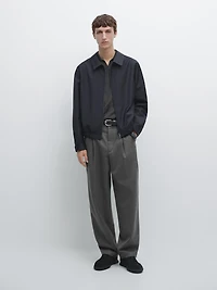 Pantalon relaxed fit à pinces en laine froide