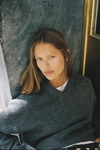 PULL EN MAILLE DOUX À BOUTONS