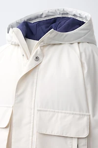 PARKA DÉPERLANTE À DÉTAILS CONTRASTÉS