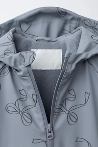 CIRÉ GOMMÉ IMPRIMÉ WATER RESISTANT