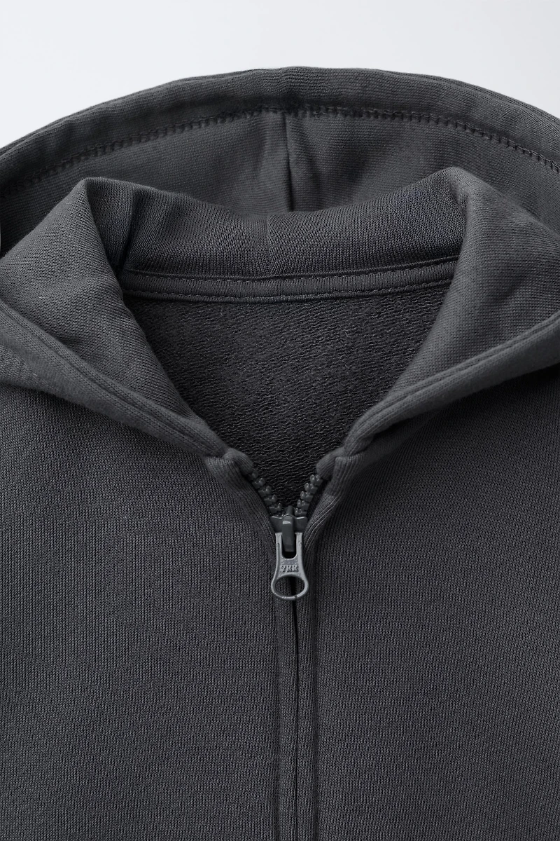 SWEAT ZIPPÉ À CAPUCHE
