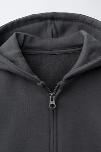 SWEAT ZIPPÉ À CAPUCHE