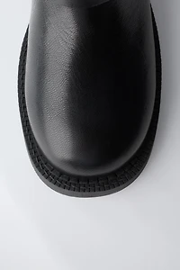 BUCKLED LEATHER BOOTS