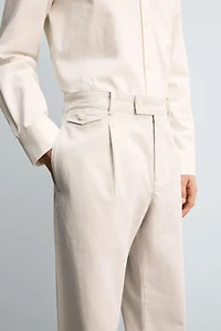 RELAXED FIT PLEATED PANTS