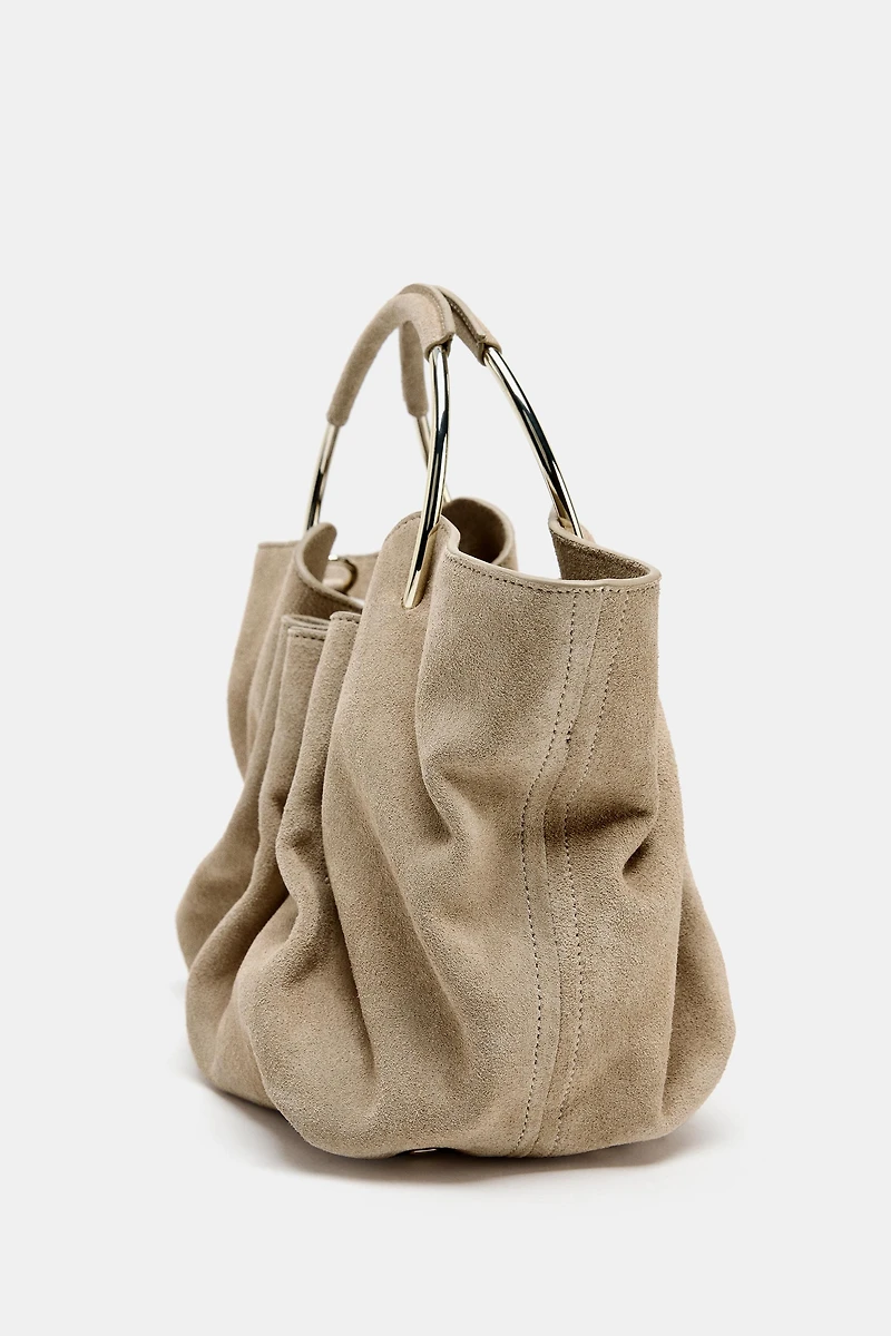 SAC SEAU EN CROÛTE DE CUIR ANSE RIGIDE