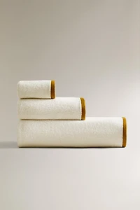 BATH TOWEL WITH RICE STITCH COLORED EDGE