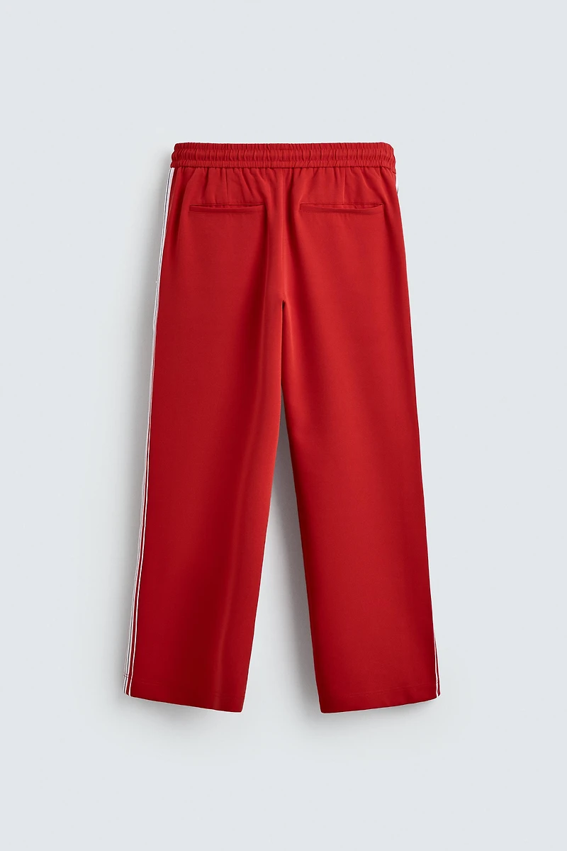 WIDE FIT JOGGER PANTS WITH SIDE STRIPES